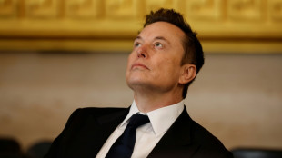 Tesla reports higher profits, topping estimates&nbsp;