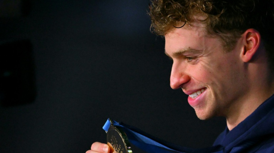 Marchand conquista ouro ap&oacute;s quebrar recorde mundial de nata&ccedil;&atilde;o; Summer McIntosh volta a vencer