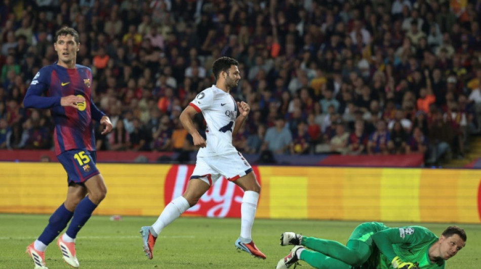 Ramos snatches Champions League holders PSG late win at Barca