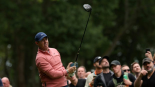 McIlroy two shots off the lead at Wentworth after eagle on 18