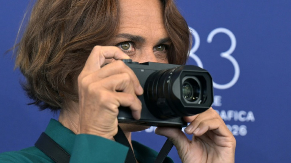 Venice festival turns gaze on war reporters, media industry