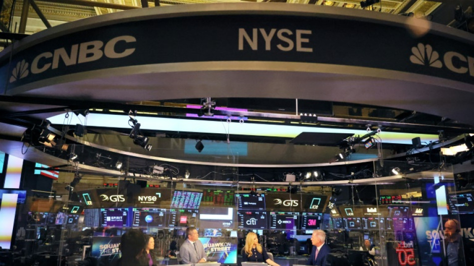 Wall Street &eacute;volue en baisse au d&eacute;but d'une s&eacute;ance charg&eacute;e en r&eacute;sultats
