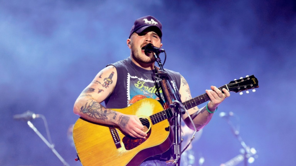 Country music star clashes with Trump govt over immigration raids