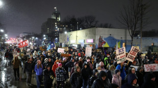 US immigration agent's fatal shooting of woman leaves Minneapolis in shock