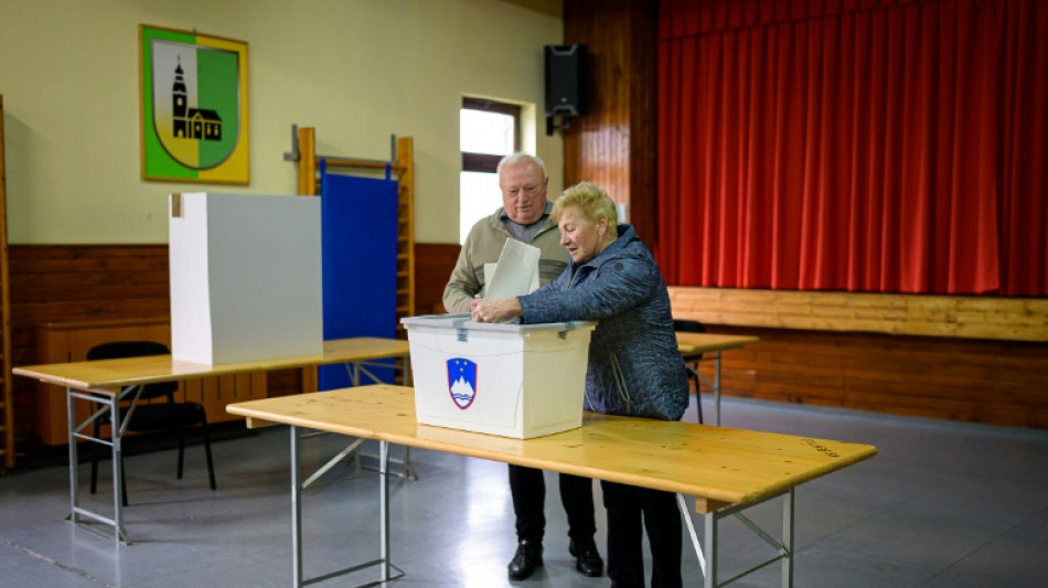 Slovenia votes in tight polls, with conservatives eyeing comeback