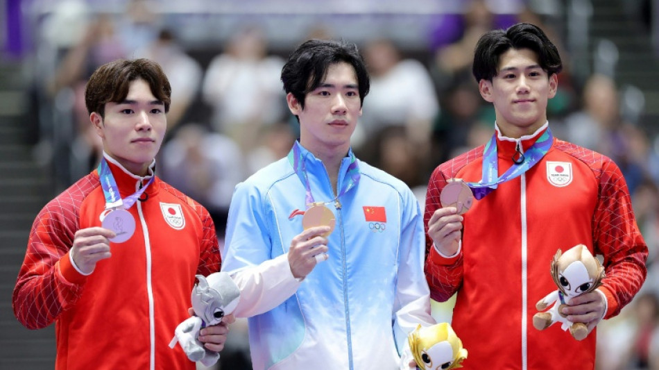 China's Zhang beats Japan rivals to Asian Games gymnastics gold