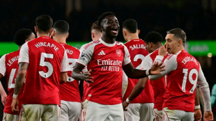 Two own goals save Arsenal blushes against Wolves